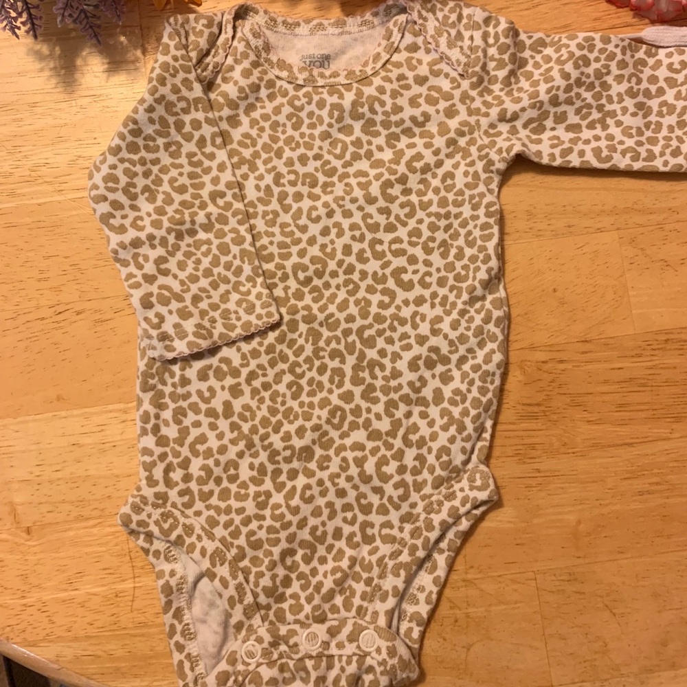 Newborn giraffe print onesie